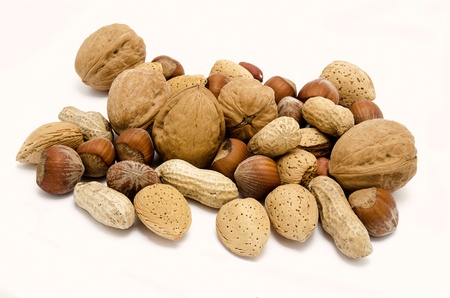 Various kinds of nuts, isolated over white background