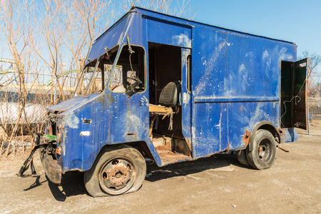 Abandoned weathered retro blue truck