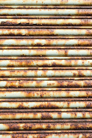 Beige and orange rusty garage doorの写真素材