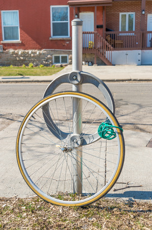 Bike theft with locked wheel in Ottawa, Canada (vintage filter)の写真素材