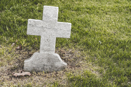 Cross shaped blank Headstone in a cemeteryの写真素材