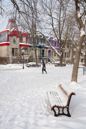 Montreal, CA - 17 December 2016: Square Saint Louis in winter with Victorian Colorful houses in  the backgroundのeditorial素材