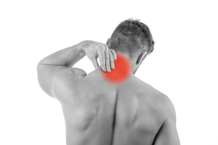 Man with neck pain over white backgroundの写真素材