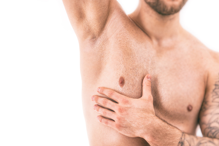 Muscular male torso with focus on armpitの写真素材