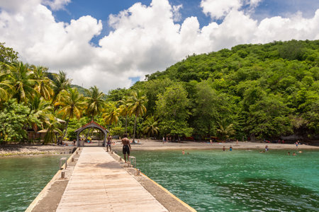 Anse Noire, Martinique, FR: 13 August 2019: People enjoying a warm day at the Anse Noire beach.のeditorial素材