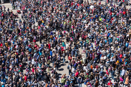 Montreal, CA - 20 May 2017: Crowd on Place des Arts attenting a street performance