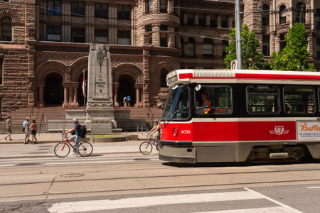 Toronto, Canada - 22 June 2019: Street car in Downtown Toronto going on College streetのeditorial素材