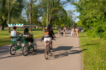 Toronto, CA - 22 June 2019: People riding bikes at Toronto Centre Island in summer.のeditorial素材