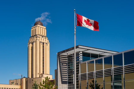 Montreal, CA - 5 September 2019: University of Montreal (UDEM) Pavilion Roger-Gaudry building & Canadian Flagのeditorial素材