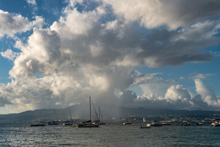 Trois-Ilets, Martinique, FR - 20 August 2019: heavy rain over Fort-De-France and Montagne Pellee Volcano.のeditorial素材