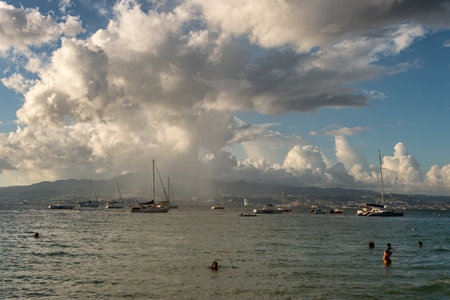 Anse-Ã -l'Ãne, Martinique, FR - 20 August 2019: heavy rain over Fort-De-France and Montagne Pelee Volcano.のeditorial素材
