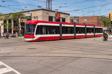 Toronto, Canada - 22 June 2019: Flexity Outlook Street car in Downtown Toronto going on Spadina Avenueのeditorial素材