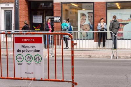 Montreal, CA - 8 May 2020:  Covid-19 Safety guideline french sign on Masson street