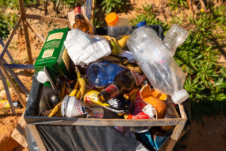 Lagos, Portugal - 7 March 2020: Rubbish on a sandy beach at Praia do Camiloのeditorial素材