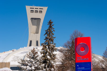 Montreal, CA - 8 February 2020: The Montreal Olympic Stadium and its inclined tower in winterのeditorial素材