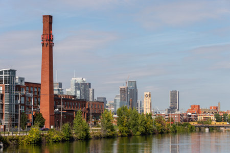 Montreal, CA - 19 september 2019: Atwater tower and Montreal Skyline from Lachine Canal.のeditorial素材