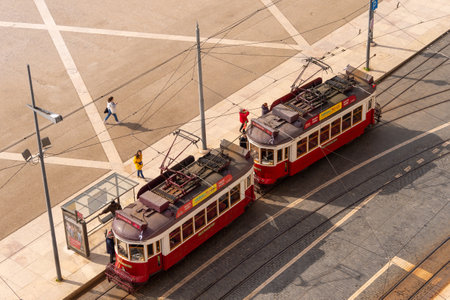 Lisbon, Portugal - 2 March 2020: red trams at the Praca do Comercio as seen from aboveのeditorial素材
