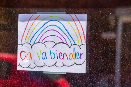 Montreal, CA - 13 May 2020: Ca va bien aller (Its going to be ok) message and rainbow on a balcony during the Covid 19 pandemy Montreal, CA - 13 May 2020: Ca va bien aller (Its going to be ok) message and rainbow on a balcony during the Covid 19 pandemy