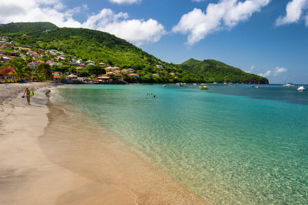 Petite Anse d'Arlet, Martinique, France - 18 August 2017: People enjoying a warm day at the beach.のeditorial素材