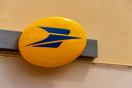 Martinique, France - 18 August 2019: Logo of La Poste, French national postal service on Rue Nationale.のeditorial素材