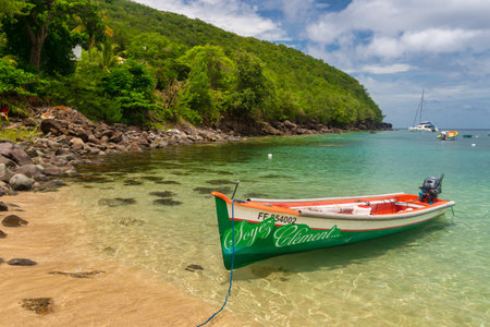 Martinique, France - 17 August 2019: Colorful fishing boats at Anse Dufour.のeditorial素材