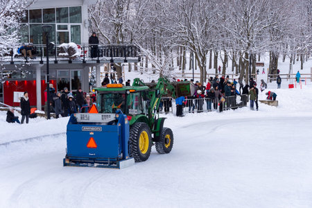 Montreal, CA - 01 January 2020: Ice rink cleaned by Zamboni resurfacing machine at the refrigerated ice rink at the top of Mount Royalのeditorial素材