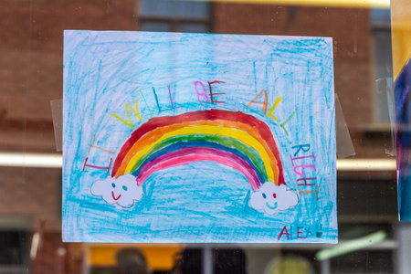 Montreal, CA - 13 May 2020: It will be all right message and rainbow drawing during the Covid 19 pandemyのeditorial素材