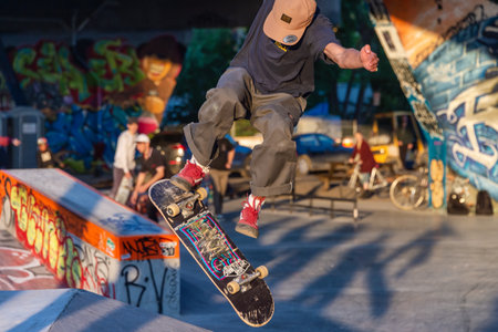 Montreal, Canada - 19 September 2019: Young Skateboarder doing a jumping trick at the Van Horne skateparkのeditorial素材