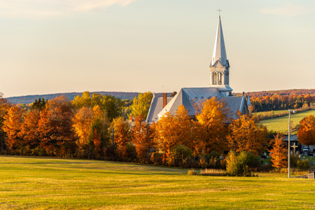 Saint-Hermenegilde, CA - 11 October 2019: Saint-Hermenegilde Church at sunset in the Autumn seasonのeditorial素材