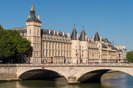 Paris, France - 23 June 2018: The "Pont au Change" bridge over river Seine and former royal palace and prison "La Conciergerie"のeditorial素材
