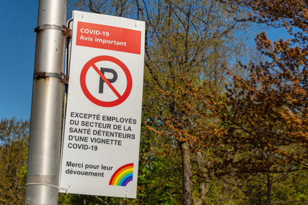 Montreal, CA - 20 May 2020: Reserved parking for Covid-19 care giversのeditorial素材