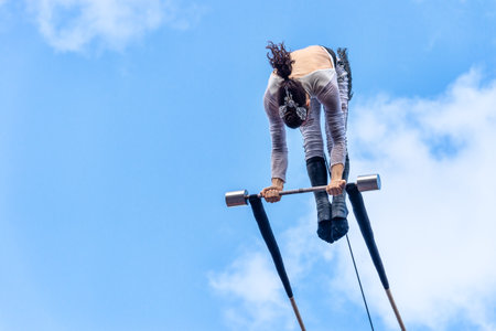 Montreal, Canada - 14 July 2018: Trapeze artist performing during Montreal Completement Cirque...