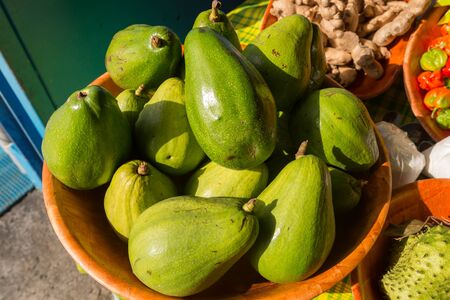 Many avocados for sale at the local market in Martinique