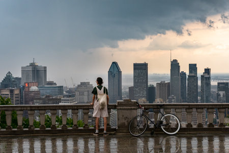 MONTREAL, CA - 6 July 2021:Montreal skyline and skyscrapers with storm clouds and heavy rainのeditorial素材