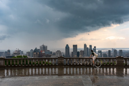 MONTREAL, CA - 6 July 2021:Montreal skyline and skyscrapers with storm clouds and heavy rainのeditorial素材