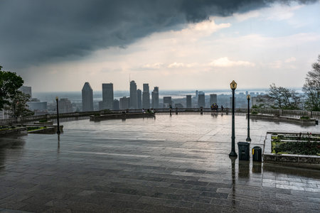 MONTREAL, CA - 6 July 2021:Montreal skyline and skyscrapers with storm clouds and heavy rainのeditorial素材