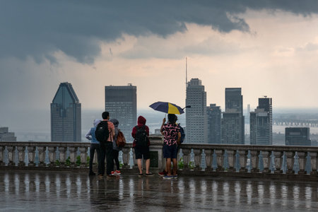MONTREAL, CA - 6 July 2021:Montreal skyline and skyscrapers with storm clouds and heavy rainのeditorial素材