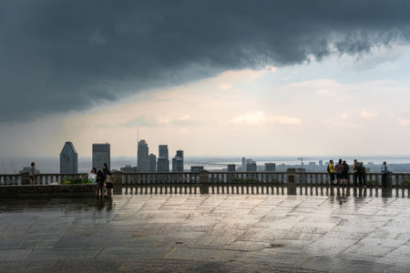 MONTREAL, CA - 6 July 2021:Montreal skyline and skyscrapers with storm clouds and heavy rainのeditorial素材