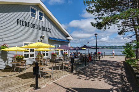 Halifax, Nova Scotia, Canada - 11 August 2021: People eating at the terrace of the Pickford and Black restaurantのeditorial素材