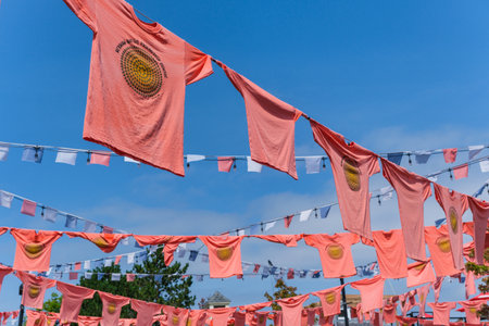 Halifax, Nova Scotia, Canada - 10 August 2021: Orange shirts hang at the Halifax waterfront to...