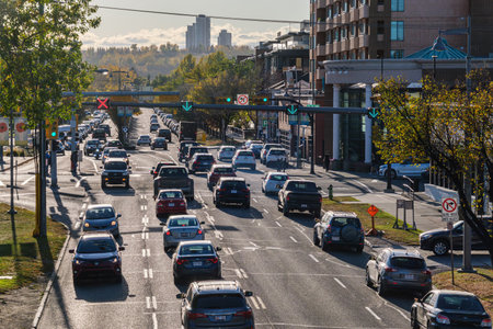 Calgary, Alberta, Canada - 1 October 2021: Traffic in Kensington districtのeditorial素材