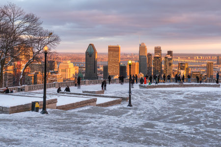 Montreal, Canada - 27 November 2021: Tourists looking at Montreal Skyline from Kondiaronk belvedere in winter.のeditorial素材