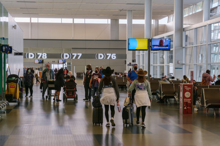 Calgary, Canada - 2 October 2021: Passengers waiting for their flights inside Calgary International Airportのeditorial素材