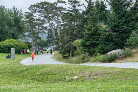 Halifax, Nova Scotia, Canada - 10 August 2021: People walking and running in Point Pleasant Parkのeditorial素材