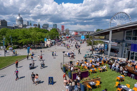 Montreal, CA - 11 June 2022: Summer attractions and shops at Montreal Old Portのeditorial素材