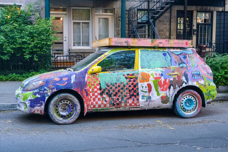 Montreal, Canada - 5 June 2022:  A car painted in colorful patternsのeditorial素材