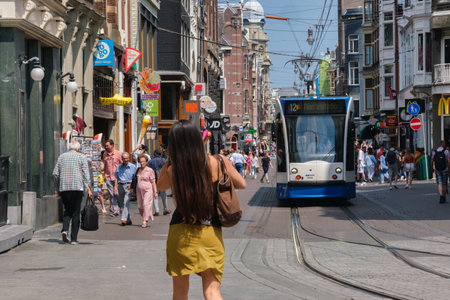 Amsterdam, The Netherlands - 23 June 2022: GVB Tram on Leidsestraat streetのeditorial素材