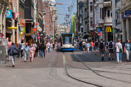Amsterdam, The Netherlands - 23 June 2022: GVB Tram on Leidsestraat streetのeditorial素材