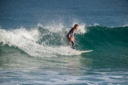 donostia-San Sebastian, Spain - 15 September 2022: Surfer on Zurriola beachのeditorial素材