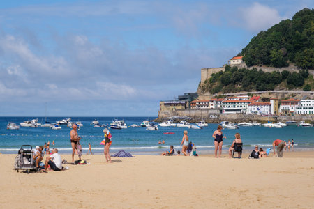 Donostia-San Sebastian, Spain - 15 September 2022: People on La Concha Beach in summerのeditorial素材